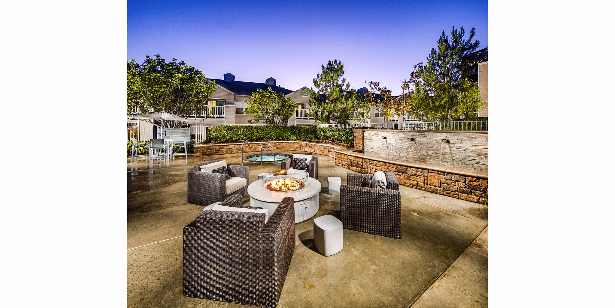 Fire pit patio area at Channel Point Apartments, perfect for outdoor gatherings and relaxation