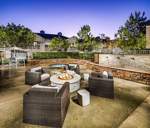 Fire pit patio area at Channel Point Apartments, perfect for outdoor gatherings and relaxation