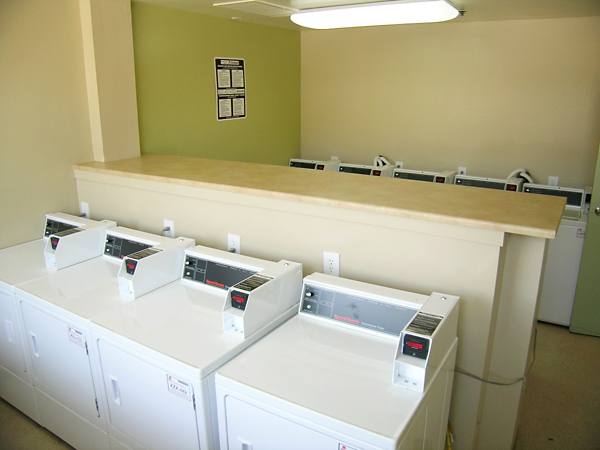 laundry facility at Towers at Hollywood Hills Apartments