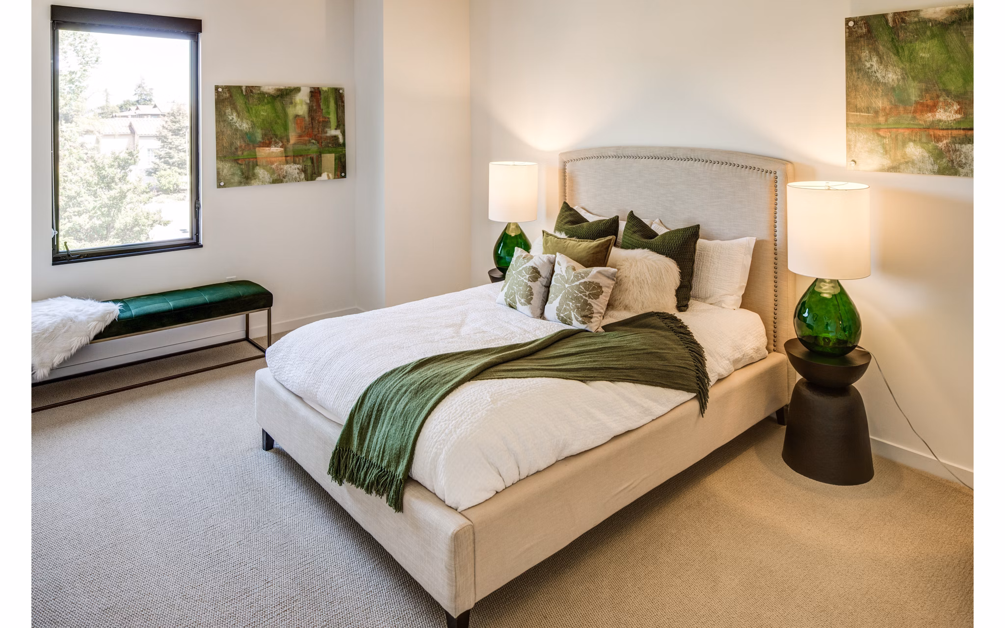 Cozy bedroom with modern decor at The Dudley Apartments