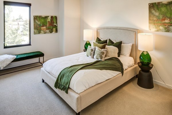 Cozy bedroom with modern decor at The Dudley Apartments