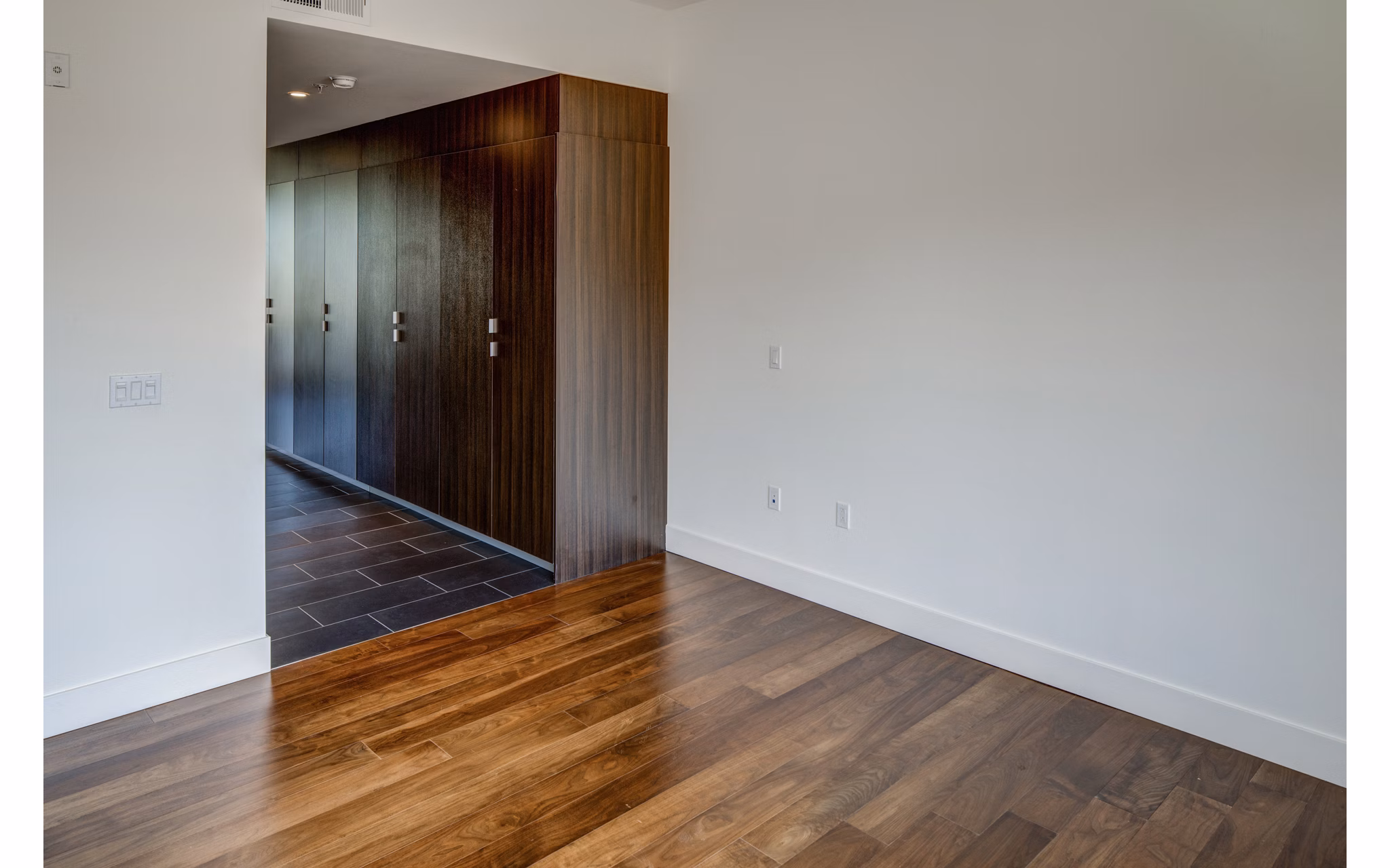 Cozy bedroom featuring modern design elements at The Dudley Apartments, a luxury living option by Greystar in the heart of the city