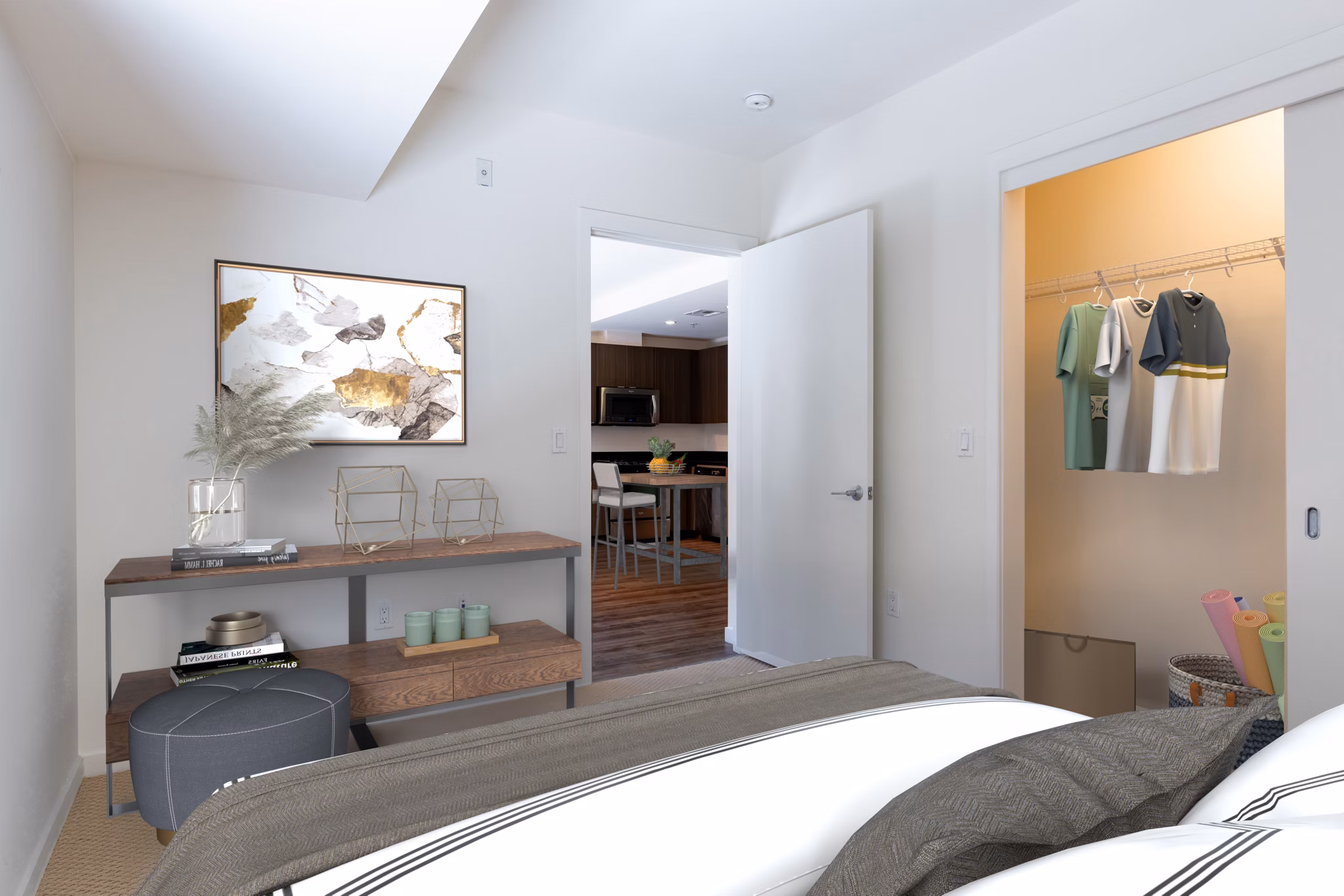 Spacious bedroom with modern furnishings at The Dudley Apartments, a luxury community by Greystar in an urban setting