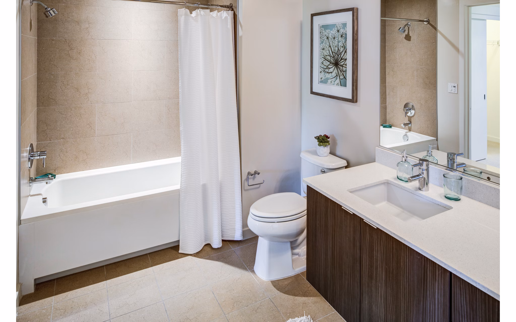 Bathroom showcasing modern fixtures at The Dudley Apartments