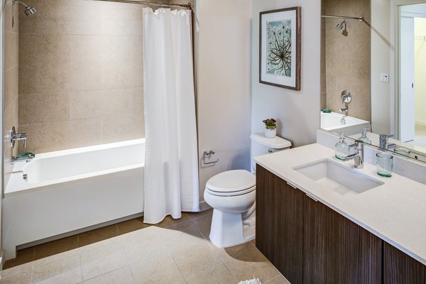 Bathroom showcasing modern fixtures at The Dudley Apartments