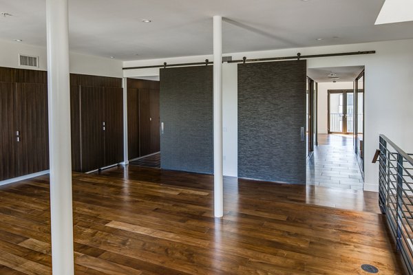 The Dudley Apartments: Clubhouse with modern amenities and stylish decor perfect for luxury living in the city