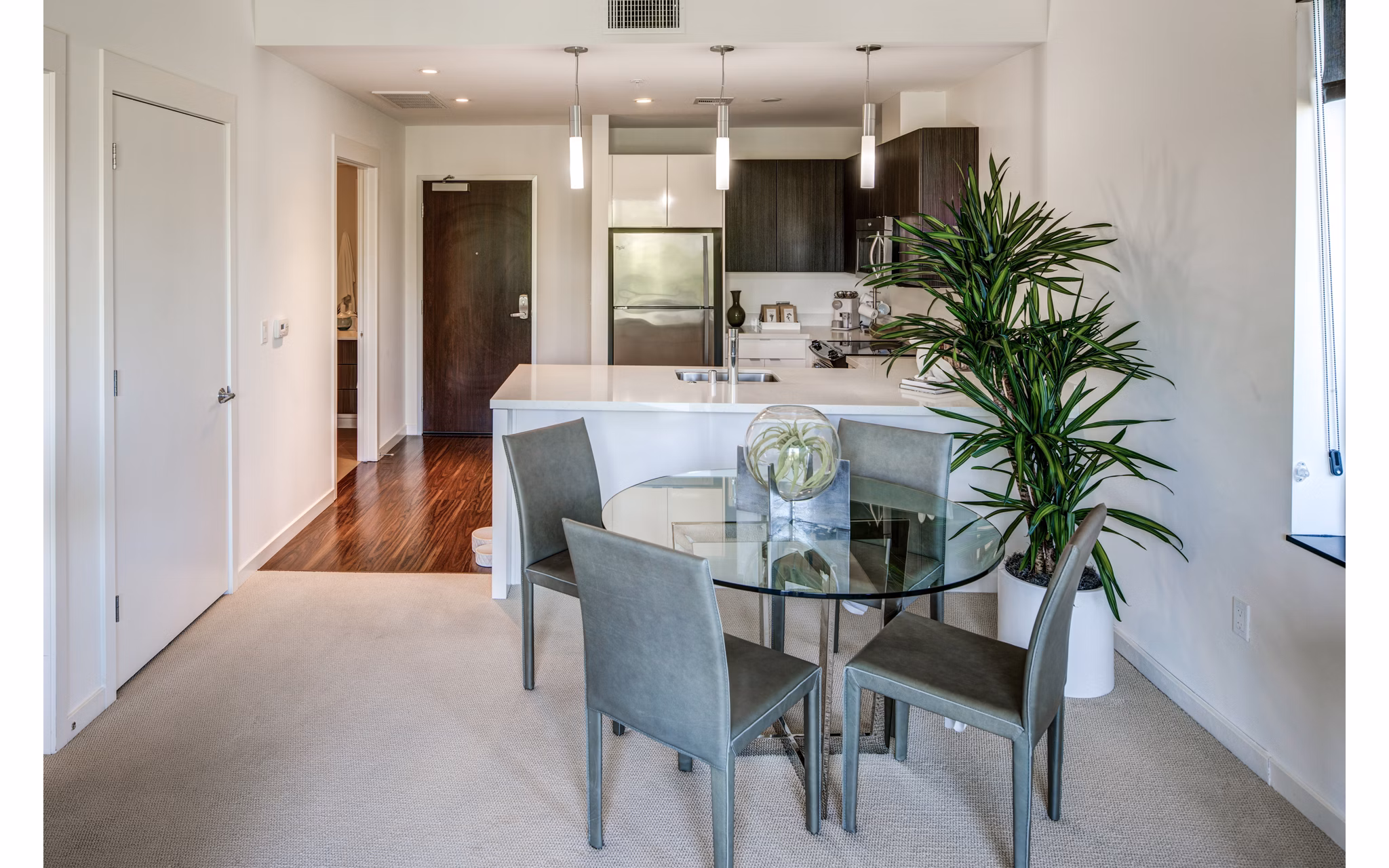 Dining area with modern furnishings at The Dudley Apartments luxury property