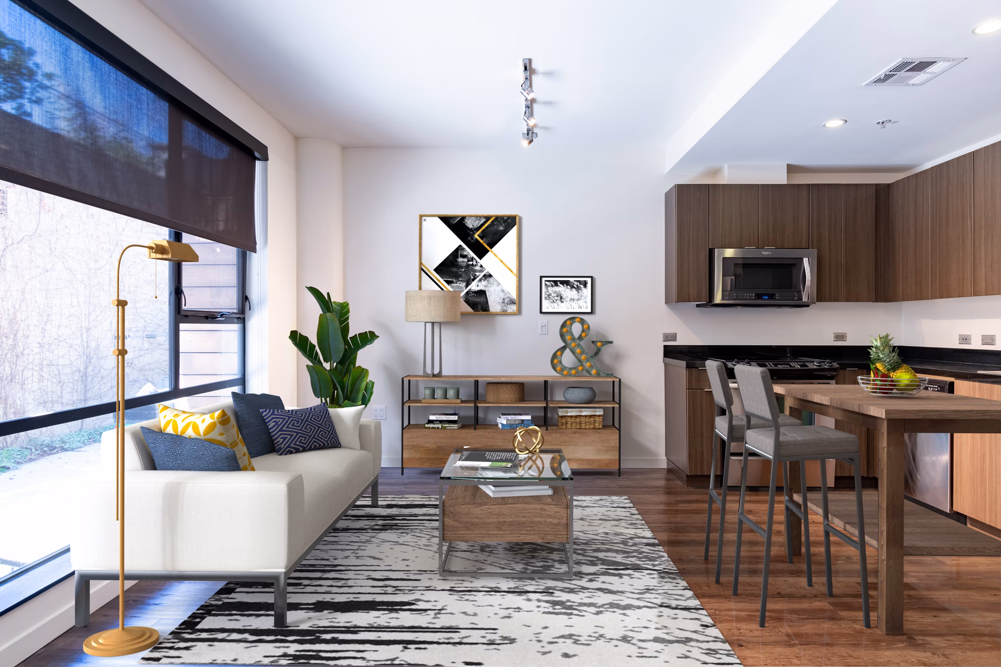 Spacious living room with modern furnishings and large windows at The Dudley Apartments, luxury living by Greystar