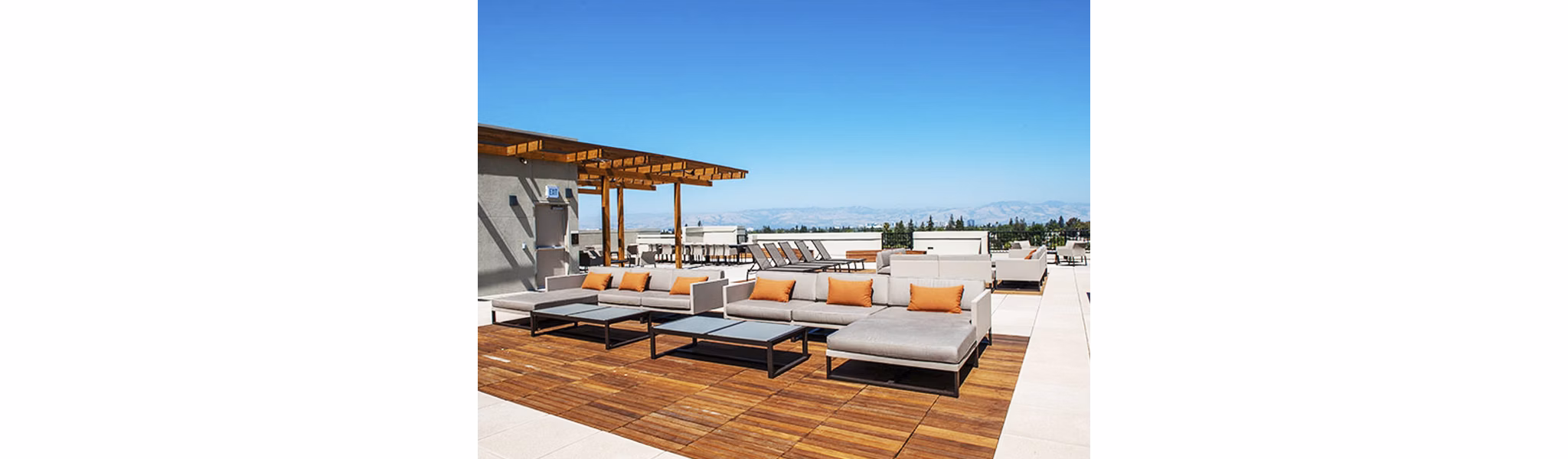 Chic outdoor patio with modern seating at Misora luxury apartments