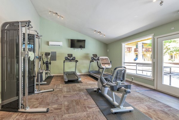 fitness center at Woodside East Apartments 