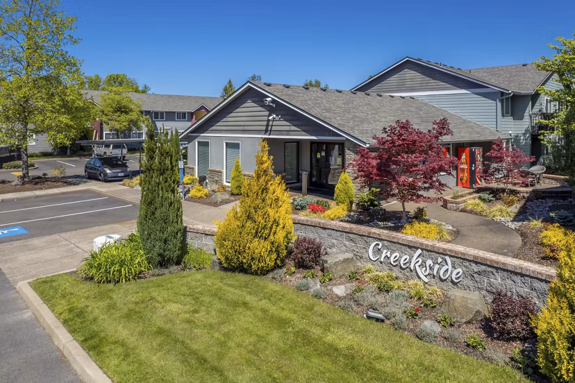 Creekside Apartments: Contemporary of luxury apartments nestled in a serene, wooded setting