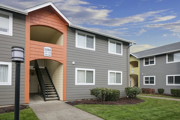 Creekside Apartments: Scenic view of luxury apartments nestled in a serene environment