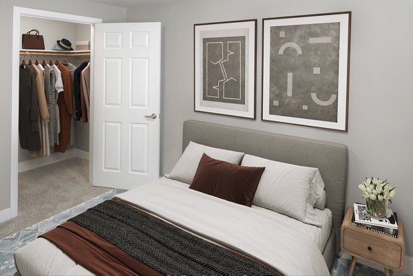 Bedroom featuring modern furnishings and natural light at Creekside Apartments