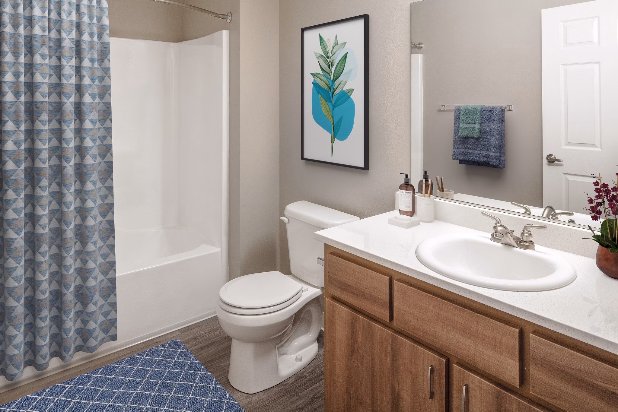 Luxury modern bathroom featuring sleek fixtures at Creekside Apartments
