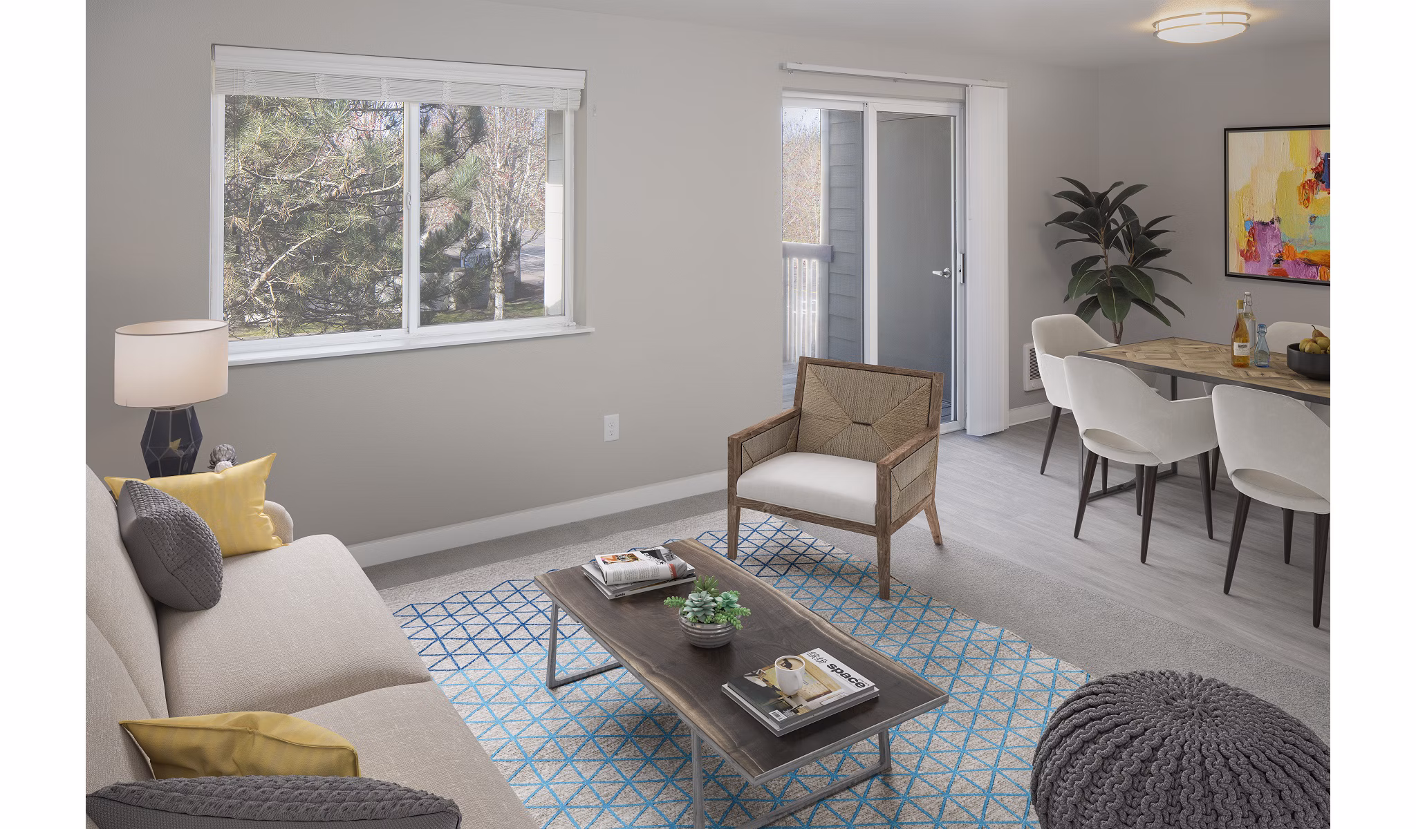 Spacious living room with modern decor and natural light in Creekside Apartments