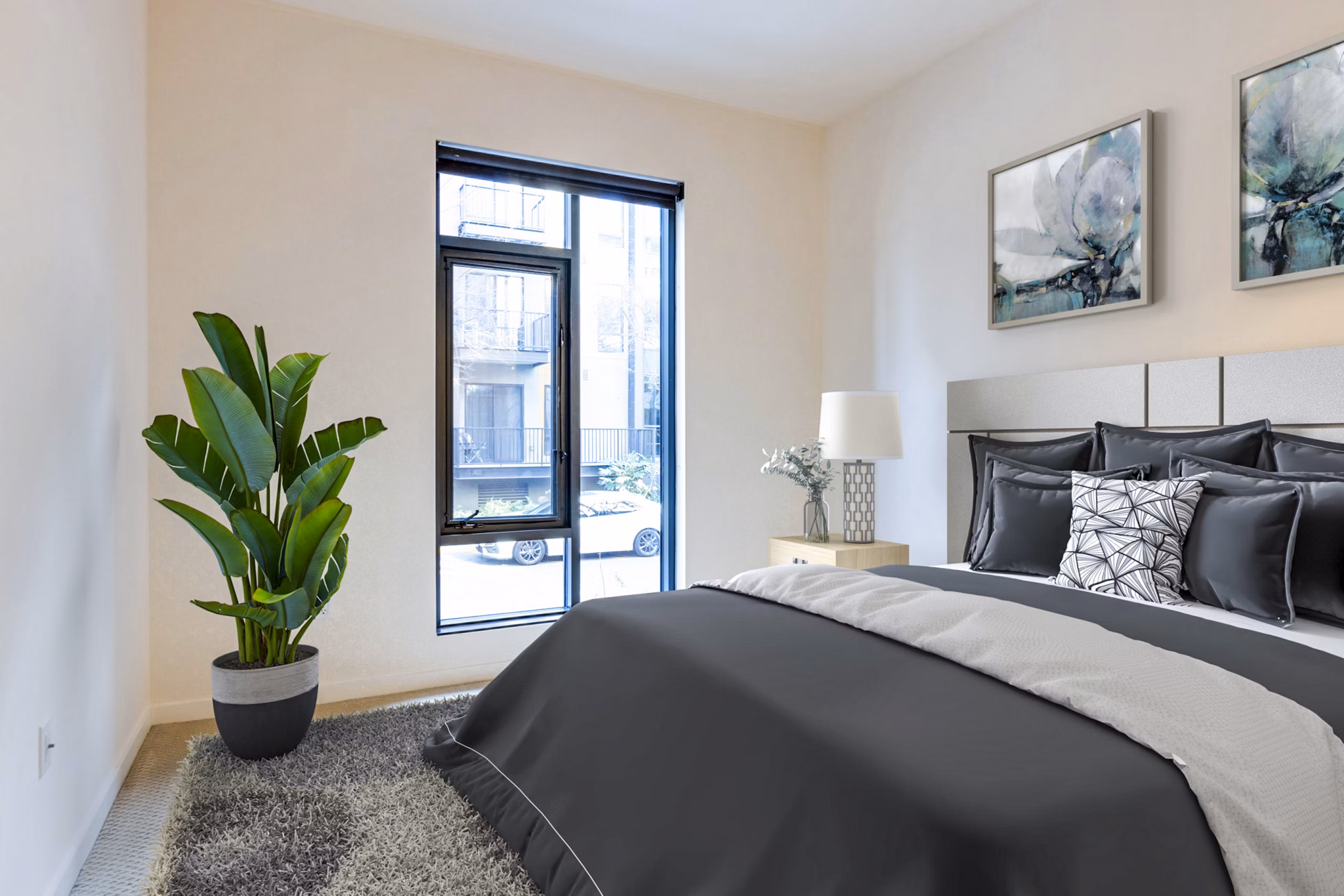 Elegant bedroom with modern decor at Levare Apartments, Greystar luxury apartments in a serene Seattle neighborhood