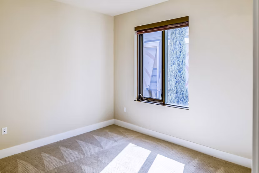 Elegant bedroom with modern furnishings at Levare Apartments, a luxury living space