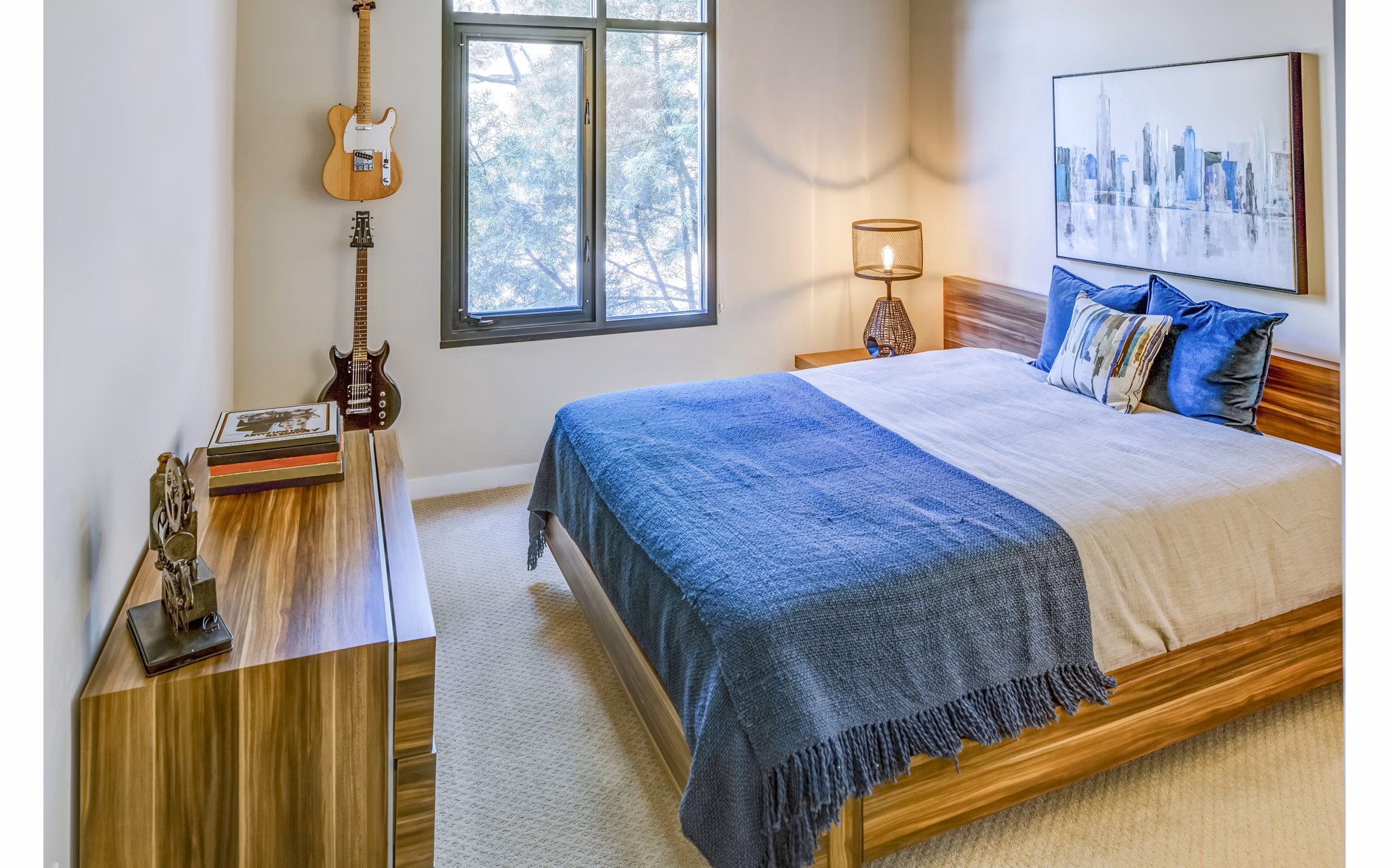 Cozy bedroom with modern decor in Levare Apartments