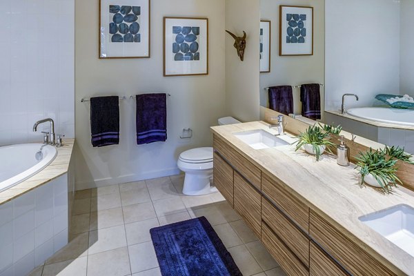 Modern bathroom with sleek fixtures at Levare Apartments, a Greystar community in downtown Portland, offering luxury living