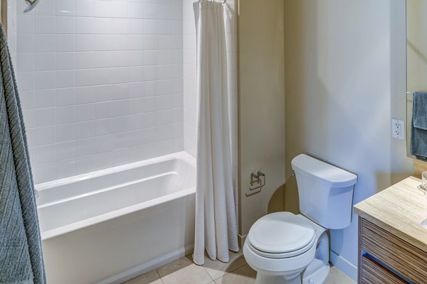 Elegant bathroom with modern fixtures at Levare Apartments in Kirkland, designed for luxurious living