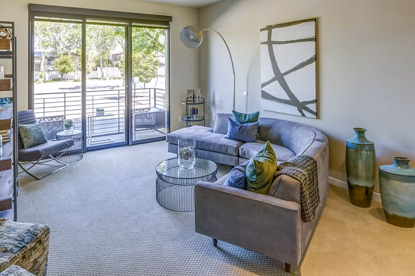 Spacious living room with modern decor in Levare Apartments