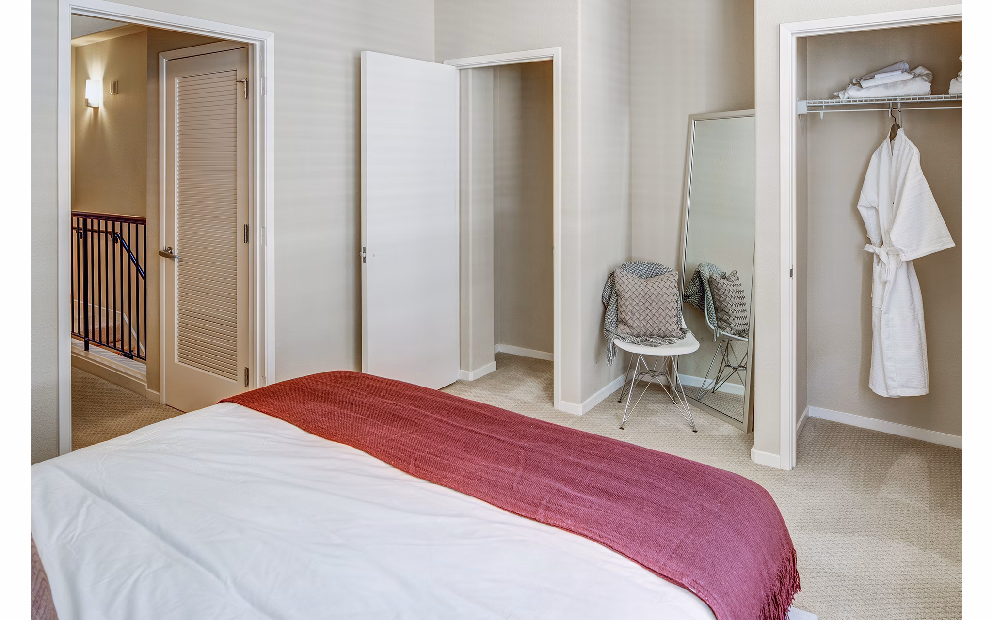 Elegant bedroom with plush bedding and contemporary design at Santana Row Apartments, luxury living in a vibrant community