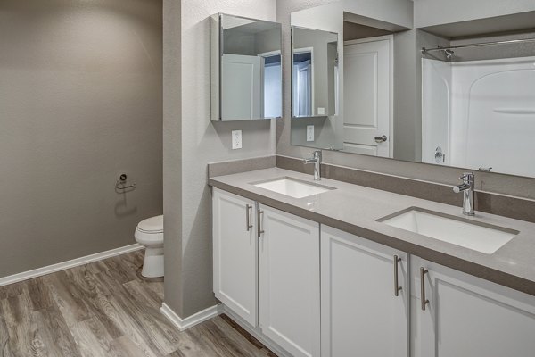 Modern bathroom with sleek fixtures and ample space at Santana Row Apartments in a luxury setting