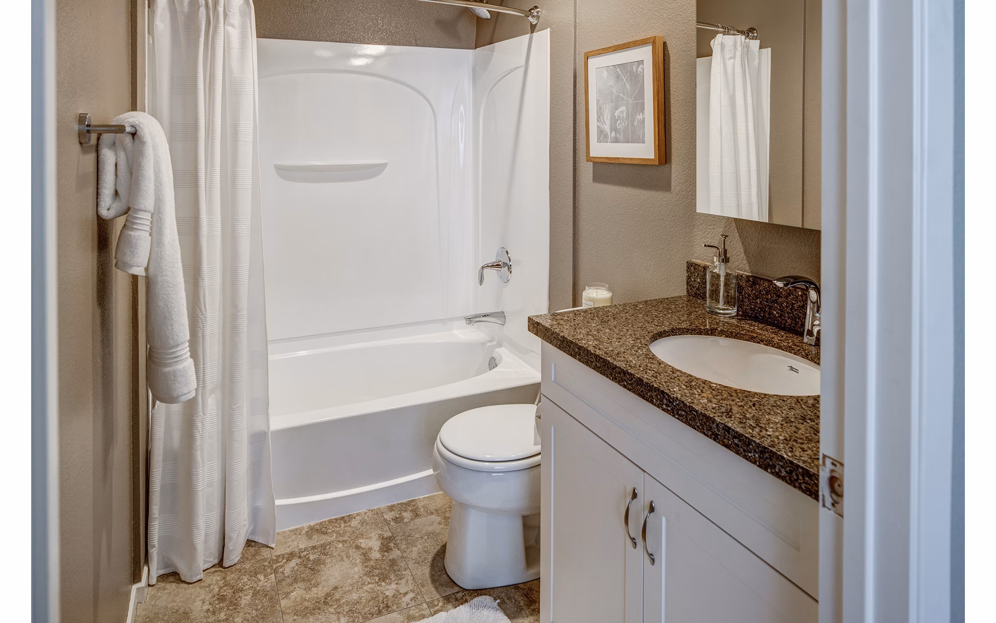 Bathroom featuring modern fixtures and elegant design at Santana Row Apartments