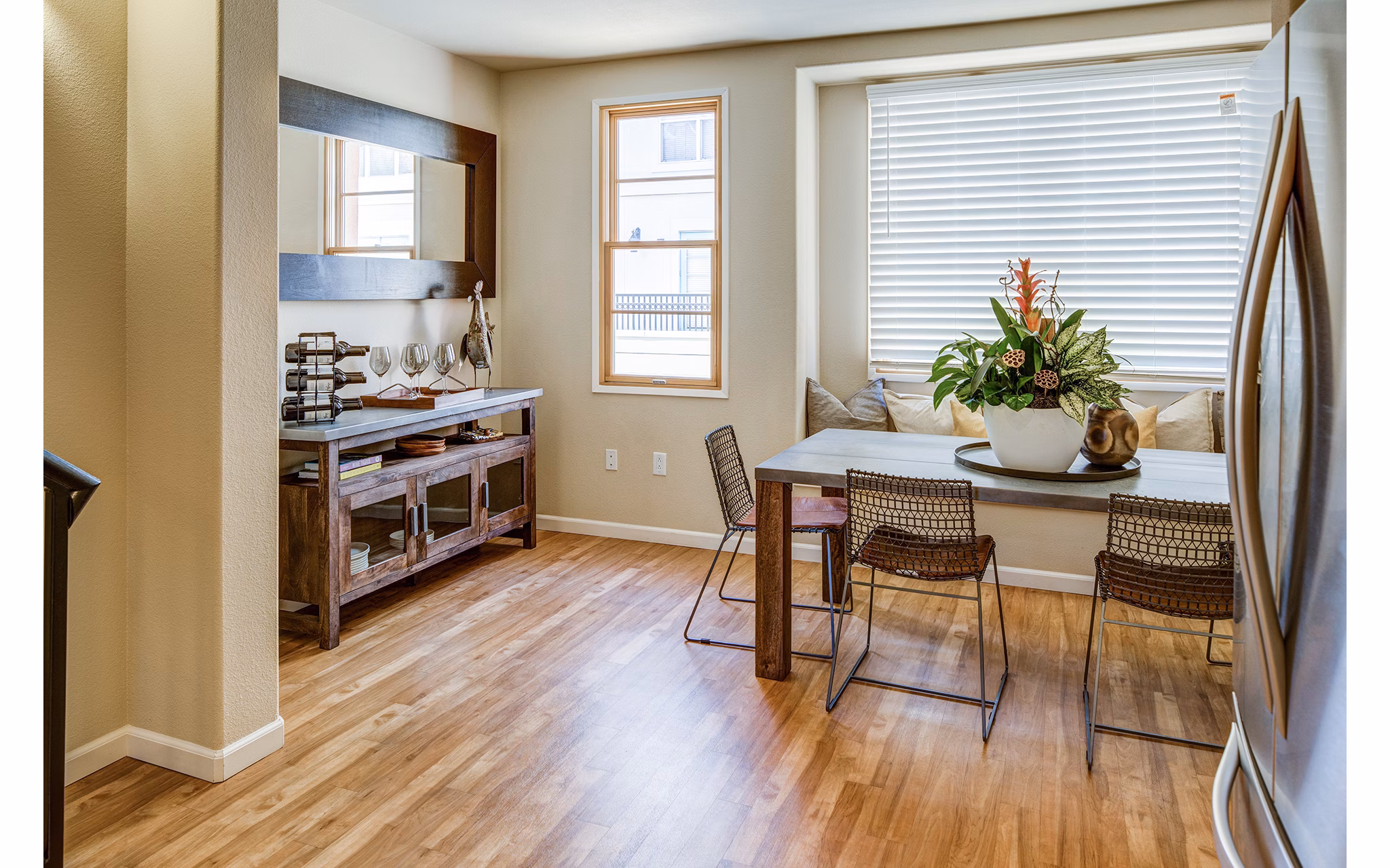 Dining area featuring modern decor and elegant lighting in Santana Row Apartments