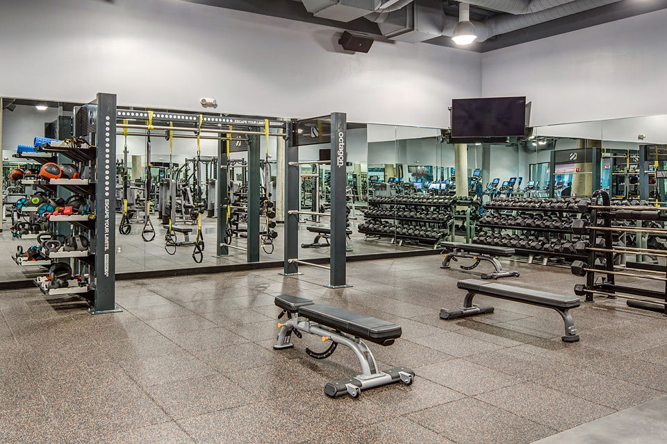 Fitness center with modern equipment at Santana Row Apartments in luxury setting