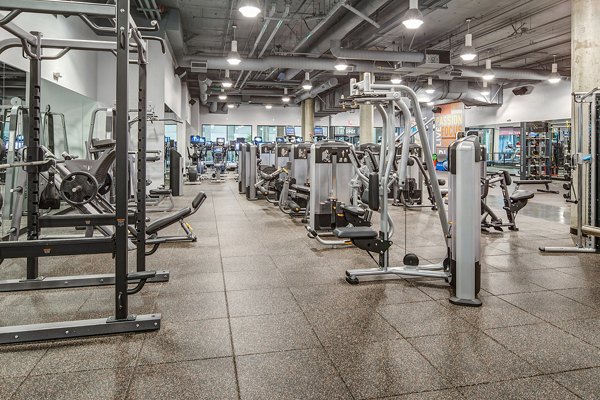 Modern fitness center with state-of-the-art equipment at Santana Row Apartments