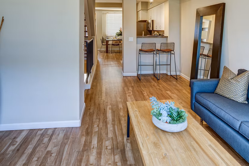 Modern living room with stylish decor at Santana Row Apartments, featuring luxury Greystar interiors