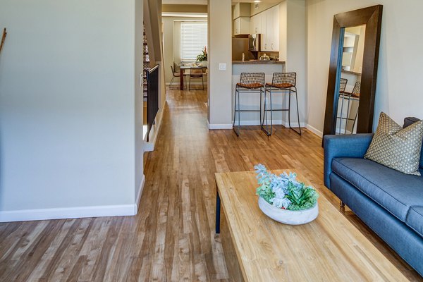 Modern living room with stylish decor at Santana Row Apartments, featuring luxury Greystar interiors