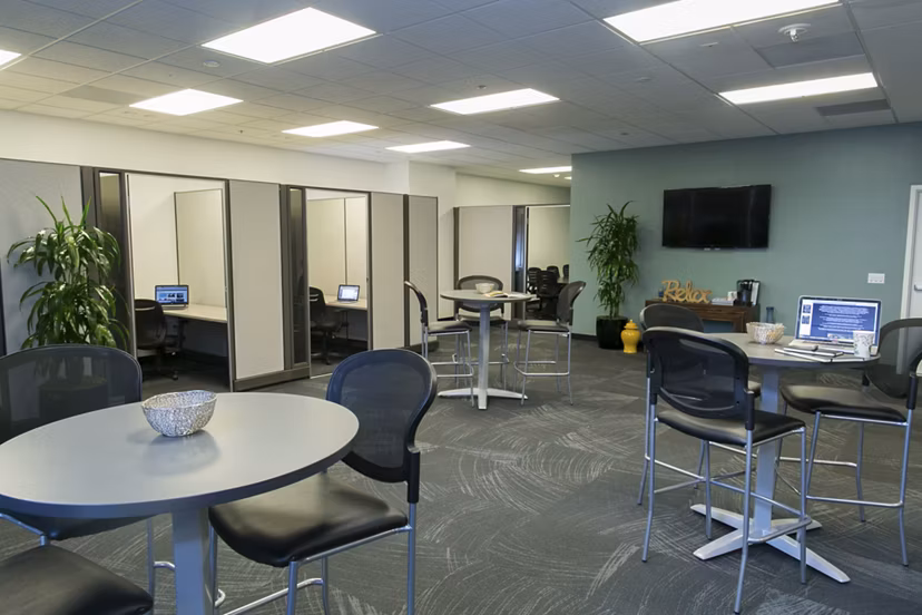 Wilshire Vermont Station Apartments: Elegant clubhouse with modern design and comfortable seating in Los Angeles