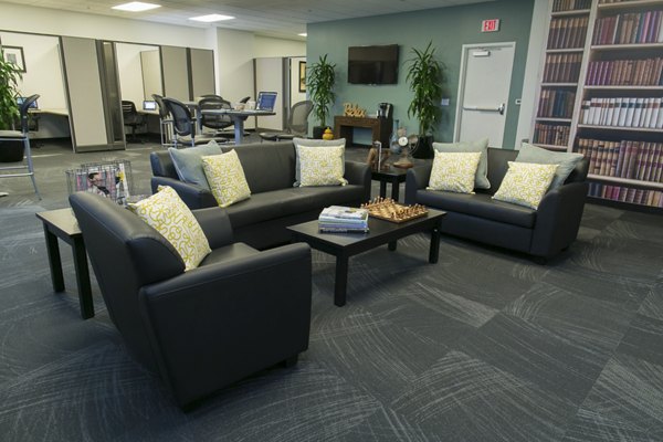 Clubhouse with modern seating and open spaces at Wilshire Vermont Station Apartments in Los Angeles