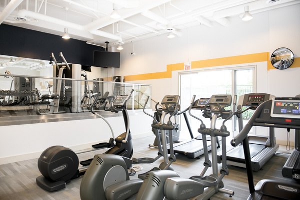 Fitness center with modern equipment at Wilshire Vermont Station Apartments