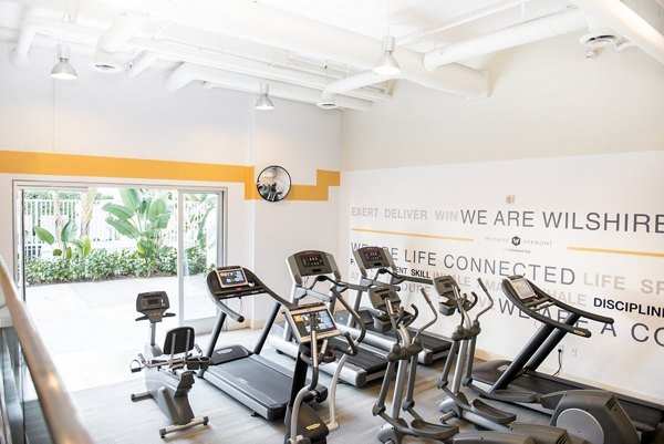 State-of-the-art fitness center with modern equipment at Wilshire Vermont Station Apartments