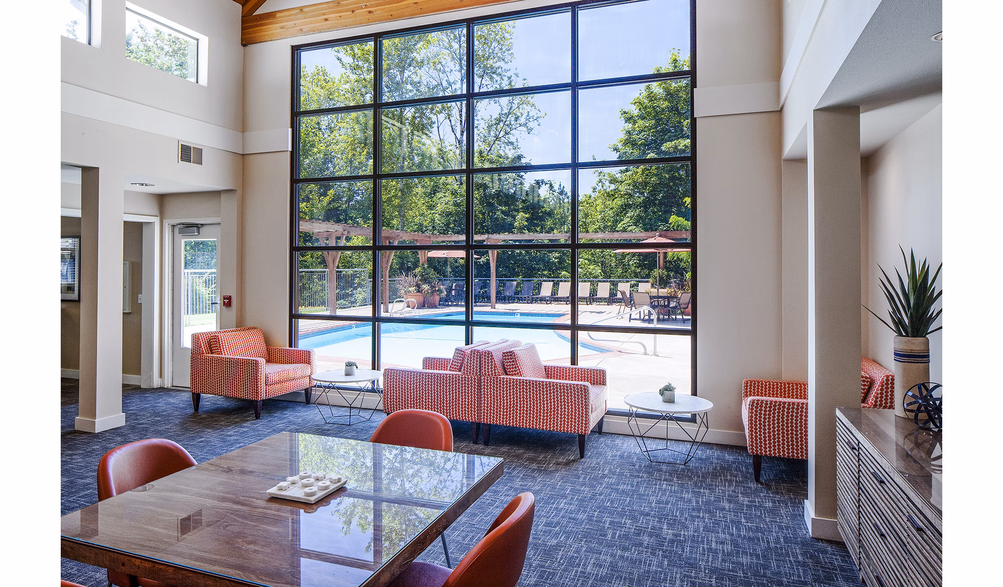 Clubhouse with modern decor and seating at Parkridge Apartments