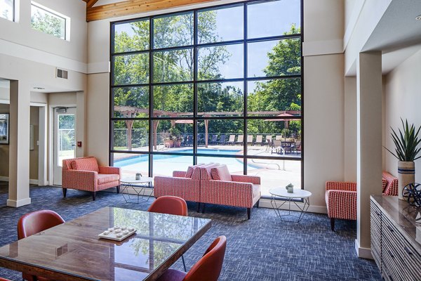 Clubhouse with modern decor and seating at Parkridge Apartments
