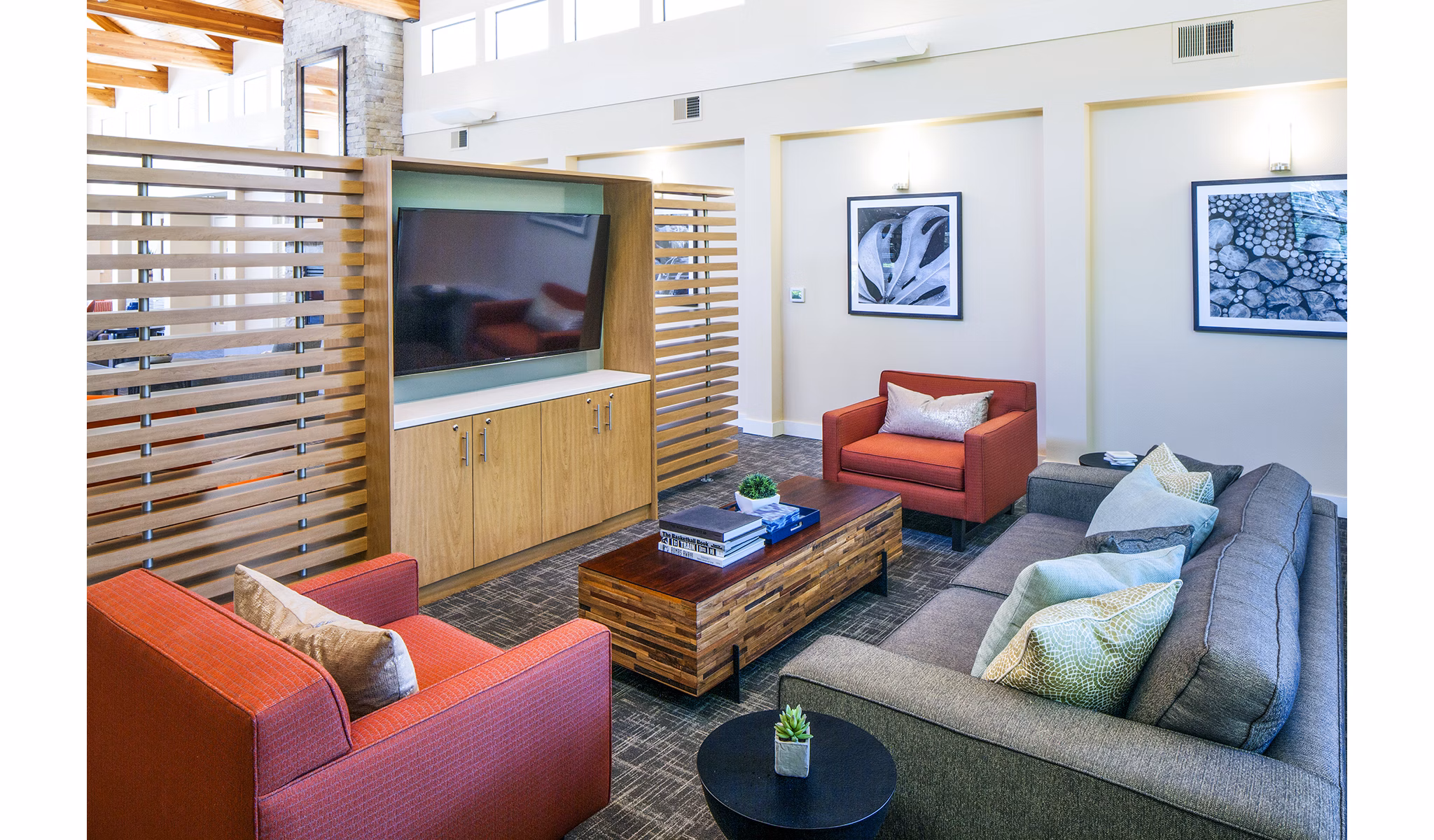 Modern clubhouse featuring open seating and stylish decor at Parkridge Apartments