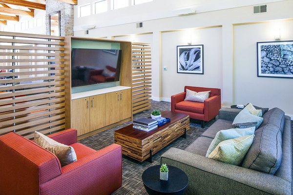 Modern clubhouse featuring open seating and stylish decor at Parkridge Apartments