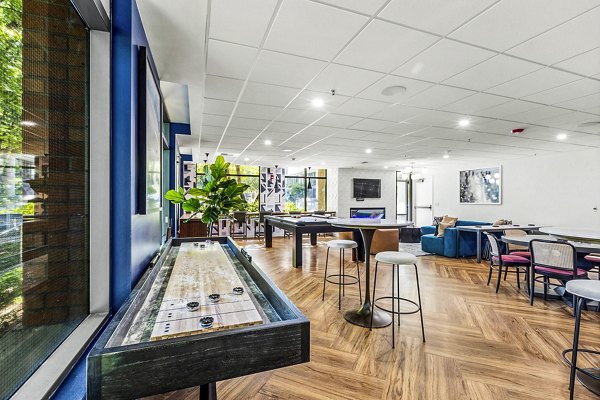 clubhouse game room at The Bristol at Southport Apartments