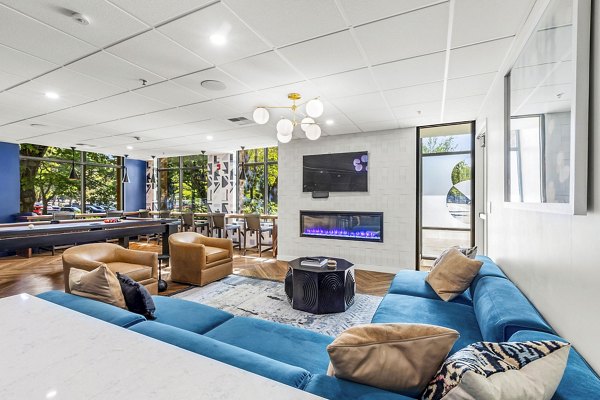 Game room featuring billiards and lounge seating at The Bristol at Southport Apartments