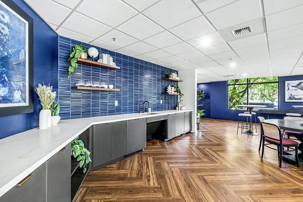 Clubhouse lobby featuring modern decor and seating area at The Bristol at Southport Apartments