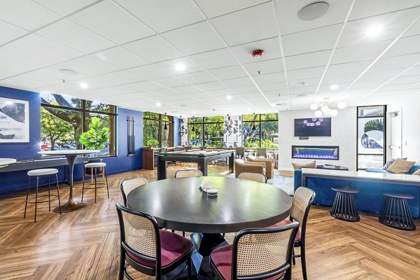 Clubhouse featuring modern design and cozy seating at The Bristol at Southport Apartments
