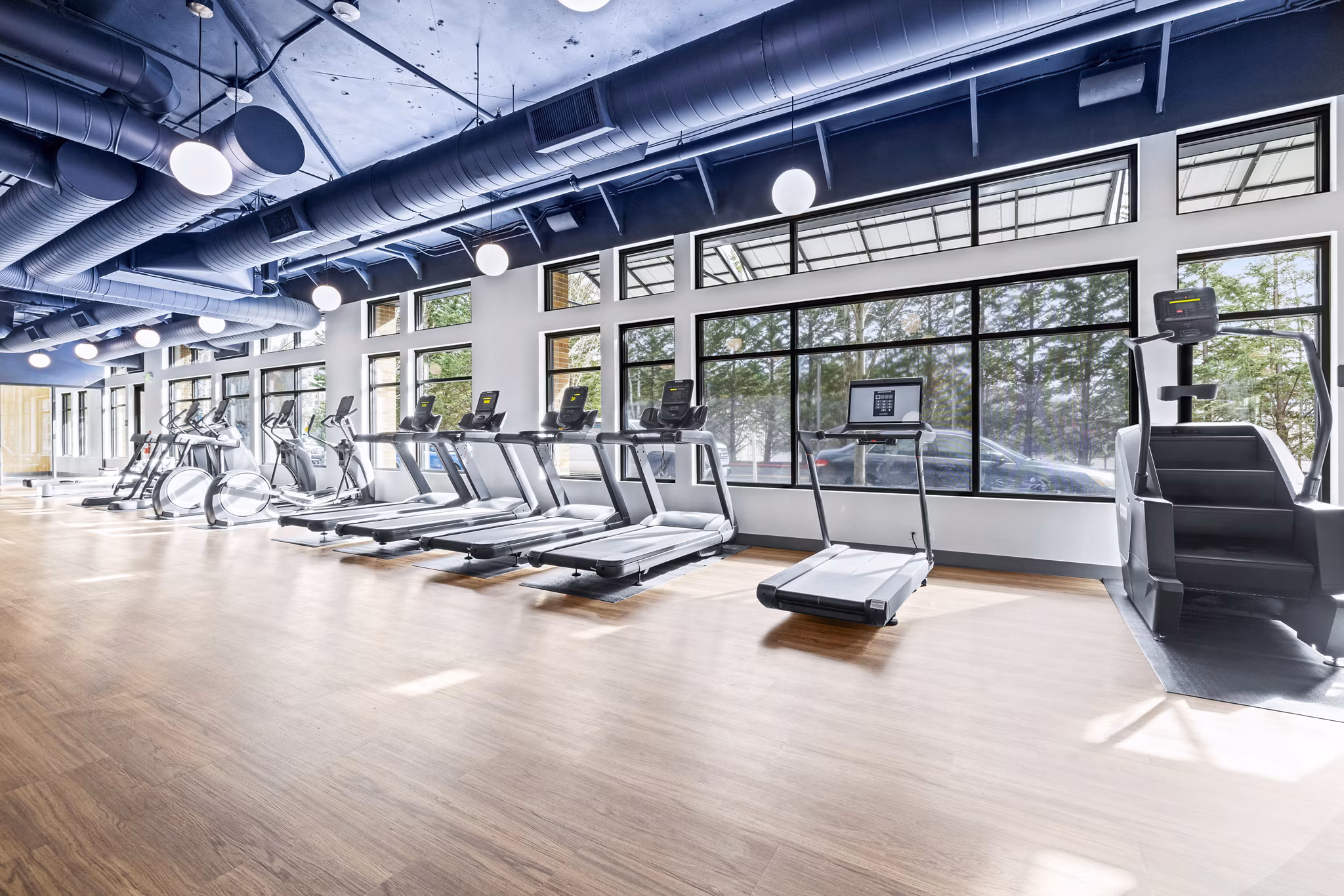 State-of-the-art fitness center with modern equipment at The Bristol at Southport Apartments Perfect for residents seeking an active lifestyle