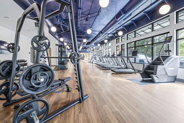 Modern fitness center with state-of-the-art equipment at The Bristol at Southport Apartments for active lifestyles