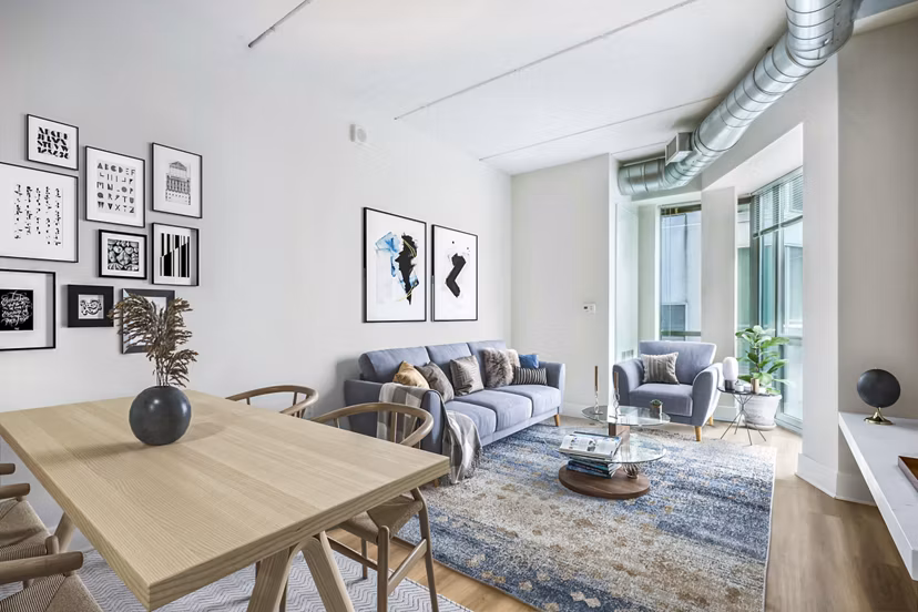Dining area with elegant lighting and modern furniture at AQ Rittenhouse Apartments, luxury apartments in Philadelphia