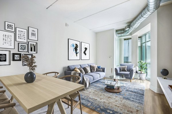 Dining area with elegant lighting and modern furniture at AQ Rittenhouse Apartments, luxury apartments in Philadelphia