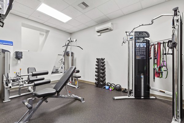 Fitness center with modern equipment at AQ Rittenhouse Apartments